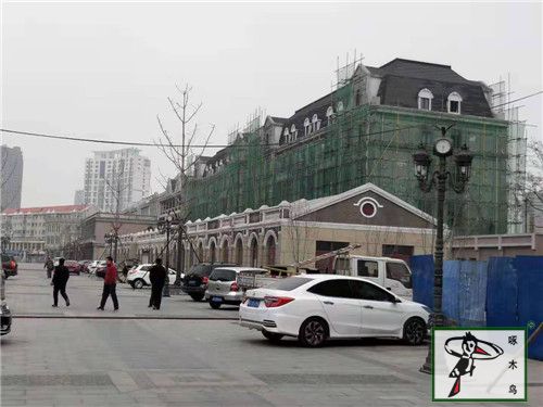 啄木鸟漆与鼎威地产达成合作-成功签约开滦路商业街外墙翻新工程项目